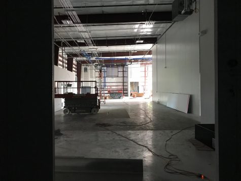As seen from the brewery's sizable cold storage facility, Flying machine plans a canning operation, with brite tanks for storage behind that, and brewing tanks at the far end of the building. (Port City Daily photo | Benjamin Schachtman)