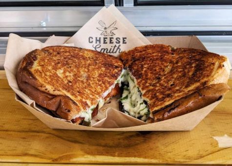 “The Brendito” comes with aged cheddar, roasted jalapenos, a cilantro and green onion cream cheese, jalapeno chutney, and bacon. (Port City Daily photo | Courtesy CheeseSmith)