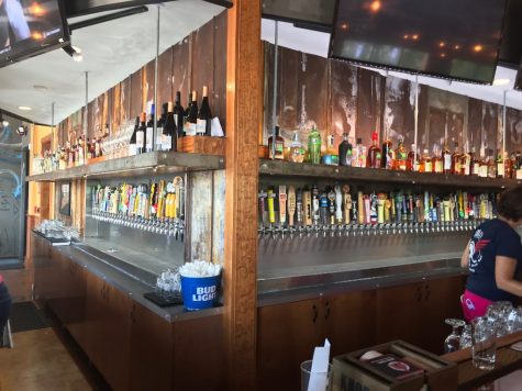 Mac's Speed Shop has beer on tap -- a lot of beer on tap. Also: a lot of beer in cans, about 400 options. (Port City Daily photo | Benjamin Schachtman)