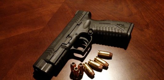 Police are searching for a suspect responsible for an early morning shooting on Queen Street (Port City Daily photo | File)