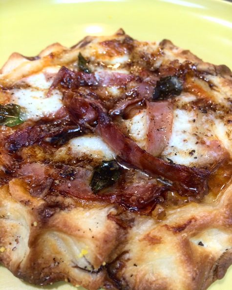 A mini biscuit pizza with basil, speck, and mozzarella, one of Chef Edelstein's tapas-style experiments proposed for "biscuit hour." (Port City Daily photo | Courtesy Micah Edelstein)