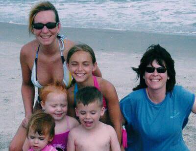 Allison Foy (top left), Lisa Valentino (right), and their children. (Port City Daily photo | Courtesy Lisa Valentino)