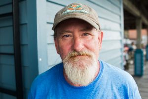 Scott Walker, pictured at the pavilion on Front Street in downtown Wilmington on Wednesday, September 6, 2018, was homeless when Top Chef star and Catch owner Keith Rhodes offered him a job. (Port City Daily photo | Mark Darrough)