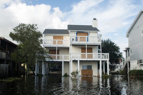 A house on the north edge of the flooded Carolina Beach Lake, Monday, September 17, 2018. (Port City Daily photo | Mark Darrough)