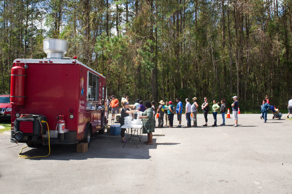 Poor Piggy's BBQ truck handing out chef-prepared World Central Kitchen meals at Gateway Community Church in Burgaw on Wednesday, Saturday 26, 2018. (Port City Daily photo | Mark Darrough)