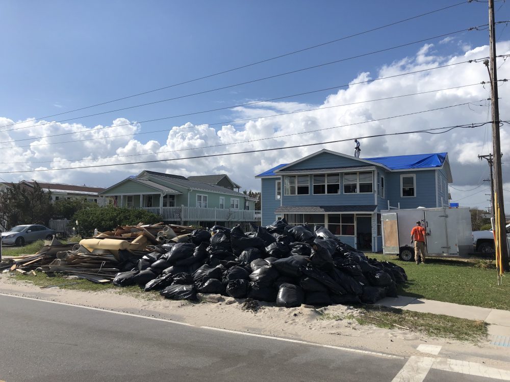 Piles of debris along North New River Road on Thursday, September 27, 2018. (Port City Daily/File photo)