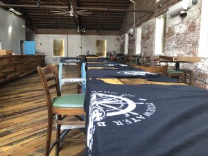 T-shirts drying at Tidewater Brewing after the storm (Port City Daily/Michael Praats)