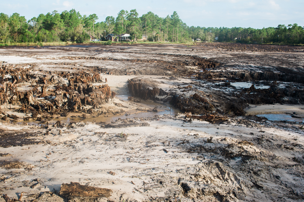 Pine Lake in Boiling Spring Lakes remains empty, and will likely remain empty for years as the city waits for federal assistance. (Port City Daily photo | Mark Darrough)