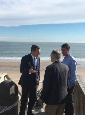 From left to right, Governor Roy Cooper meets with Surf City Mayor Doug Medlin and business owner Steven Pasquantonio in December. (Port City Daily photo/Courtesy Town of Surf City)