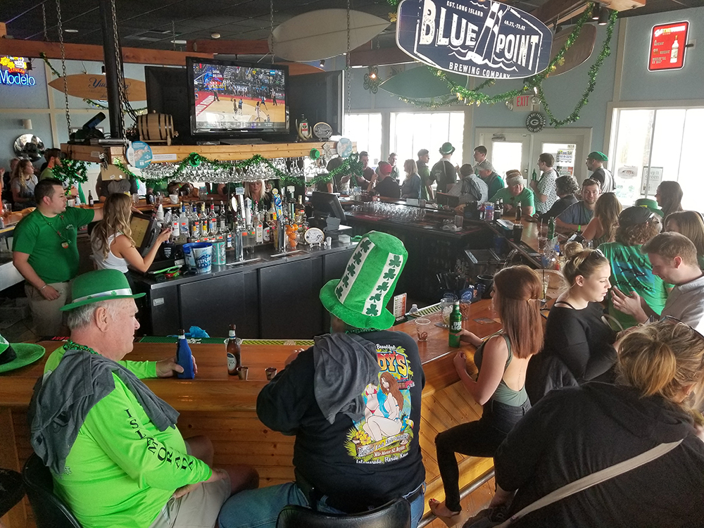 Last year's pub crawl at the first bar, Tortuga's Nest. Its organizer, Tortuga's co-founder Angela Crain, expects 300 to 500 people to show this year. (Port City Daily photo/Courtesy Angela Crain)