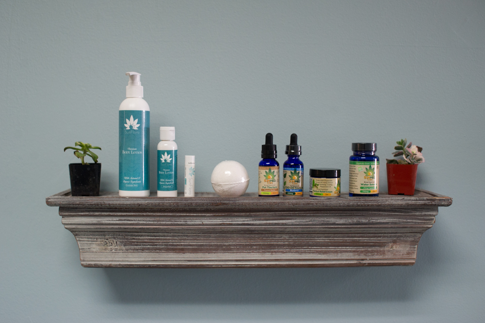 Your CBD Store products include, from left to right, lotions, chapstick, bath bombs, pet tincture, oil tincture, pain relief cream, and water soluble pills to mix into drinks. Other products include gummies and pet treats. (Port City Daily photo/Mark Darrough)