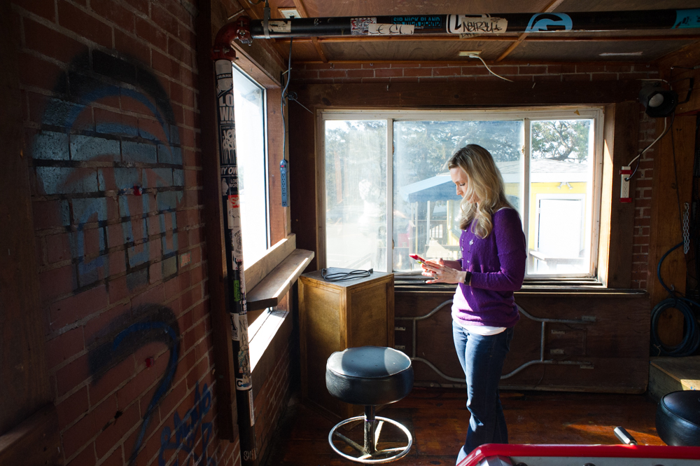 Anna Brothers inside Red Dogs bar, where her husband Andrew is fighting for an ABC permit. (Port City Daily photo/Mark Darrough)