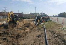 Installation of new water and sewer lines along Highway 421. (Port City Daily photo / Cape Fear Public Utility Authority)