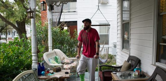 Justin Sartain at his home on Dock Street in downtown Wilmington. (Port City Daily photo/Mark Darrough)