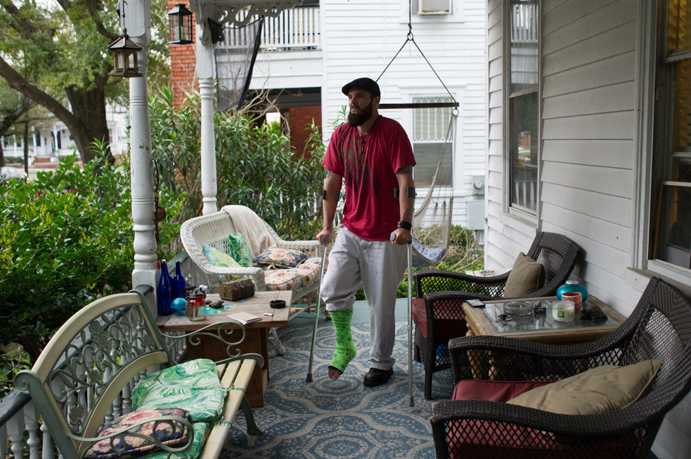 Justin Sartain at his home on Dock Street in downtown Wilmington. (Port City Daily photo/Mark Darrough)