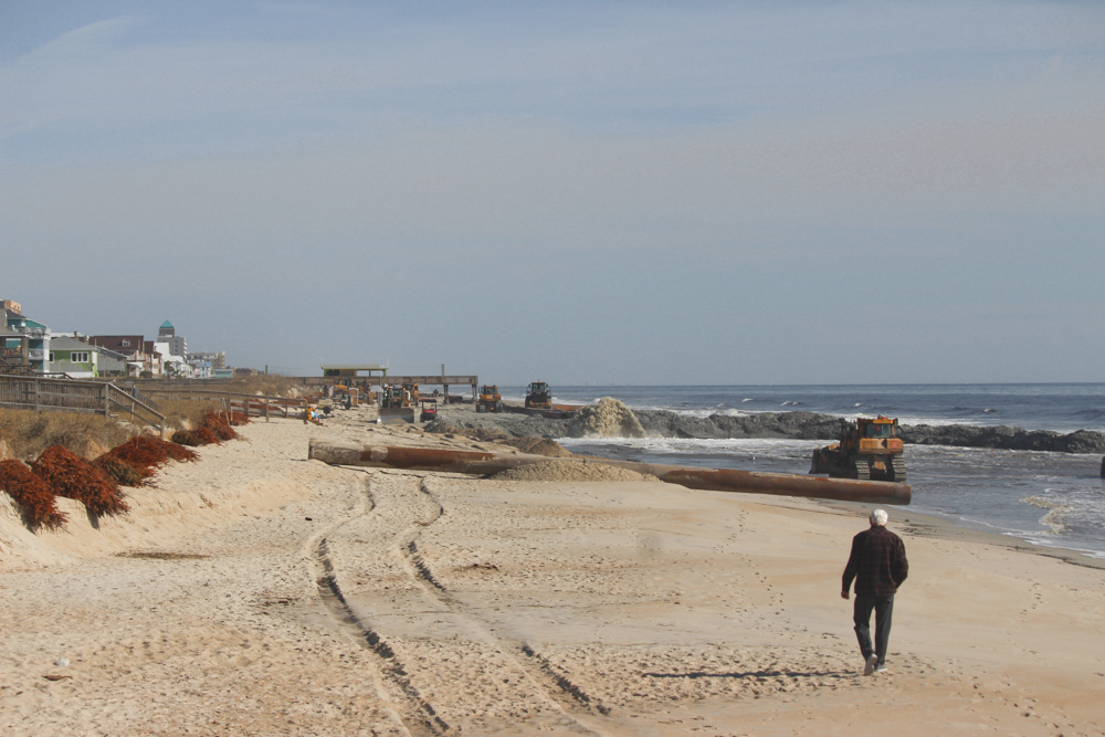 The beach is closed in some parts of Carolina Beach while work continues (Port City Daily/Michael Praats)