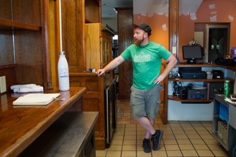 Former Waterman's head brewer Zac Brown mulls over renovation work behind the bar of the future Stalk & Vine in downtown Wilmington. (Port City Daily photo/Mark Darrough)