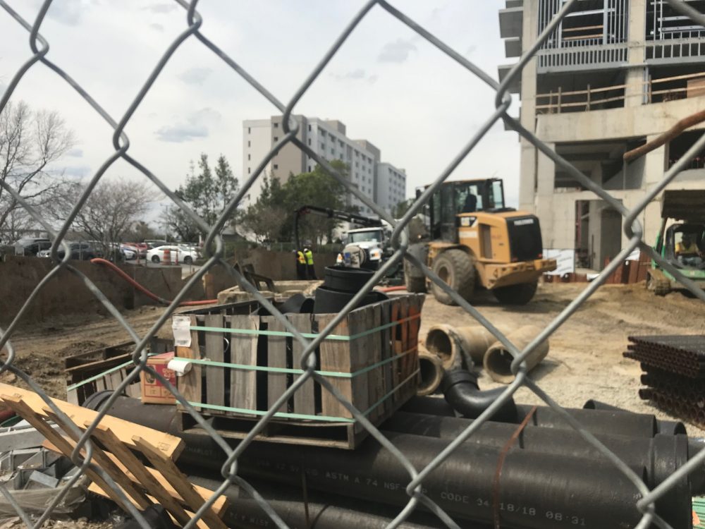 Construction on the sewer infrastructure a block over is still staging in front of the Water Street businesses. (Port City Daily photo / Benjamin Schachtman)