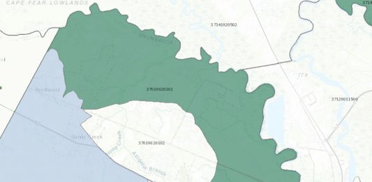 All of Navassa's town limits, northern portions of Leland's town limits, and northern unincorporated Brunswick County (shown in green) fall in a U.S. Census tract that qualifies as an Opportunity Zone (OZ). A large portion of central Brunswick County north of U.S. 17 (shown in blue) is also an OZ. (Port City Daily photo/Courtesy Department of the Treasury)