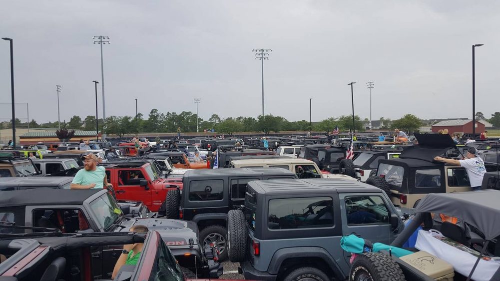 Participants of last year's Carolina Beach Jeep Go Topless Day gathered at Ashley High before police escorted them to Freeman Park. (Port City Daily photo/Courtesy Carolina Beach Jeep Go Topless Day)