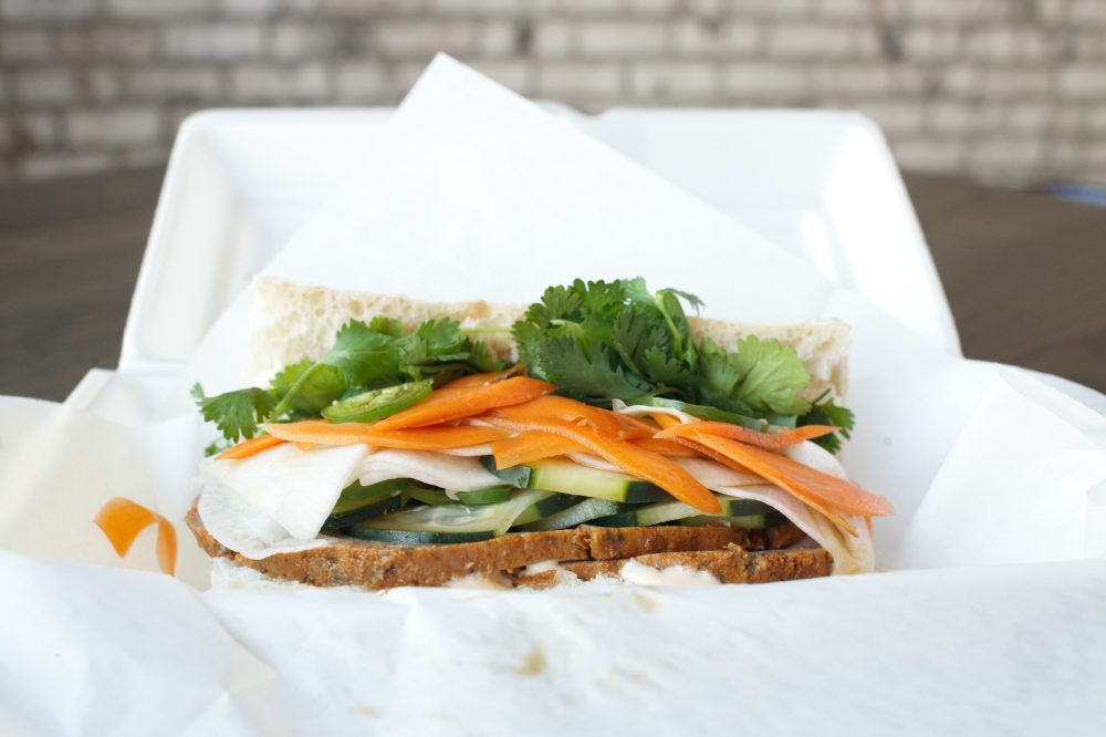 The "Esther Howard" made with pork roast, cucumber, cilantro, and pickled daikon and carrots. (Port City Daily photo/Mark Darrough)