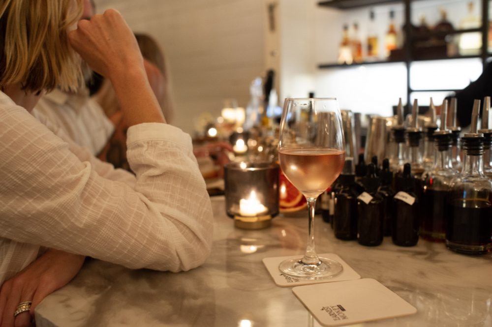 Longtime Manna patron Susannah Wheeler at the bar of the new Earnest Money & Sons. (Port City Daily photo/Mark Darrough)