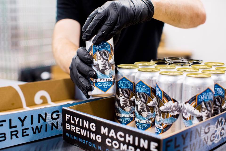 Inside the brewhouse, finished cans of the Electra IPA. (Port City Daily photo/Courtesy Matthew Ray)