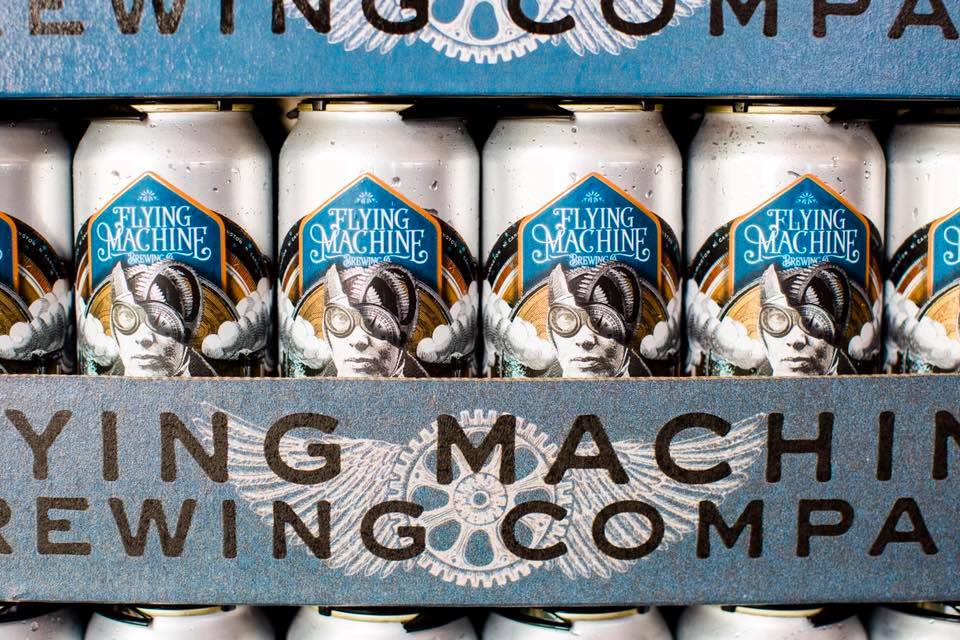 New cans of the Electra IPA. Co-owner David Sweigart called the label designs "sophisticated steampunk," a style inspired by 19th-century industrial machinery. (Port City Daily photo/Courtesy Matthew Ray)