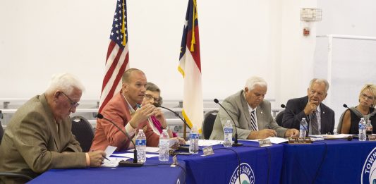 Surf City Councilman Jeremy Shugarts addresses traffic concerns of the proposed Surf City Crossing complex on Tuesday night. (Port City Daily photo/Mark Darrough)