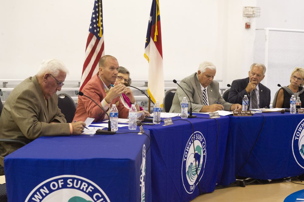 Surf City Councilman Jeremy Shugarts addresses traffic concerns of the proposed Surf City Crossing complex on Tuesday night. (Port City Daily photo/Mark Darrough)