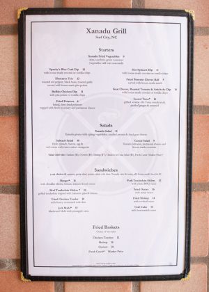 The menu for the recently opened Xanadu Grill. (Port City Daily/Mark Darrough)