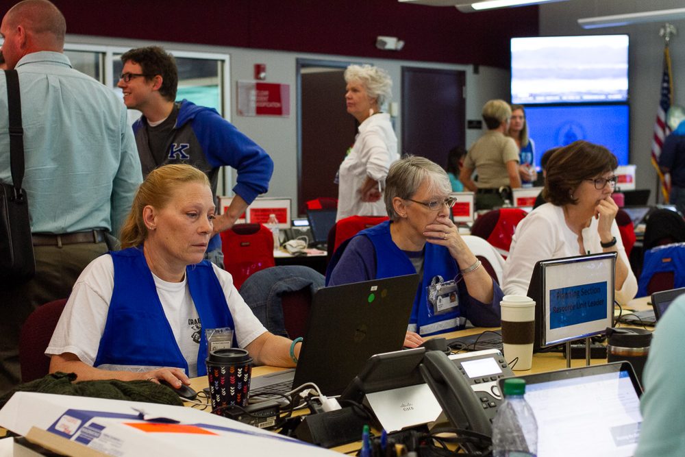 With New Hanover County offices closed, county staff members fill the seats of the New Hanover County Emergency Operations Center Tuesday morning to prepare for Hurricane Dorian. (Port City Daily photo/Johanna Ferebee)