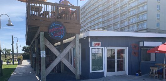 The sidewalk in front of Hurricane Alleys was built on private property without an easement. (Port City Daily/Michael Praats)