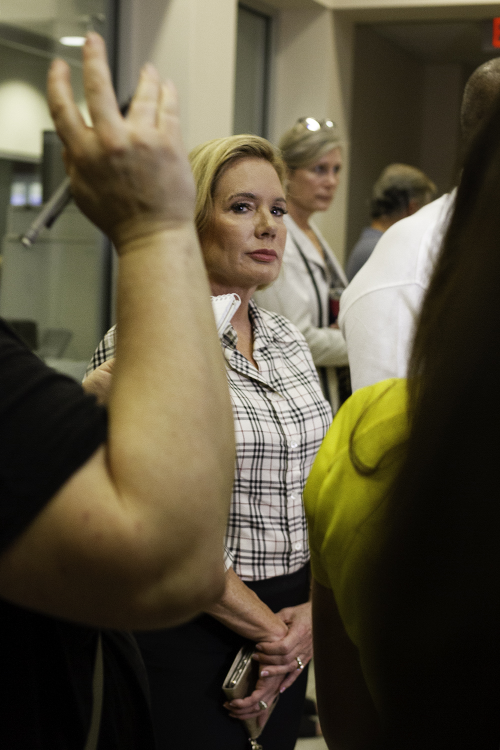 Representative Holly Grange, who recently accounced her candidacy for governor, accompanies North Carolina Governor Roy Cooper as he addresses the media in the New Hanover County Emergency Operations Center. (Port City Daily photo/Johanna Ferebee)