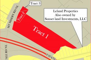 (Shown in red) Three parcels owned by Sunset Land Investments LLC could be annexed into town limits, rezoned from commercial to residential, and given $164,000 in economic incentives at Leland's Sept. 19 Town Council meeting. Unincorporated Brunswick County property shown in beige; existing town limits shown in yellow. (Port City Daily graphic/Courtesy Town of Leland)