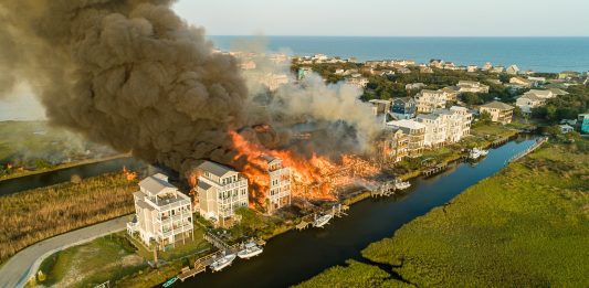 The Atkinson Road fire on Topsail Island in Surf City caused an estimated $5 million in damages. (Port City Daily photo/Courtesy Wilton C Wescott)