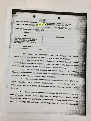 A court case from 2000 shows just how long the town has been trying to get the beach bar Red Dogs closed (Port City Daily/Michael Praats)