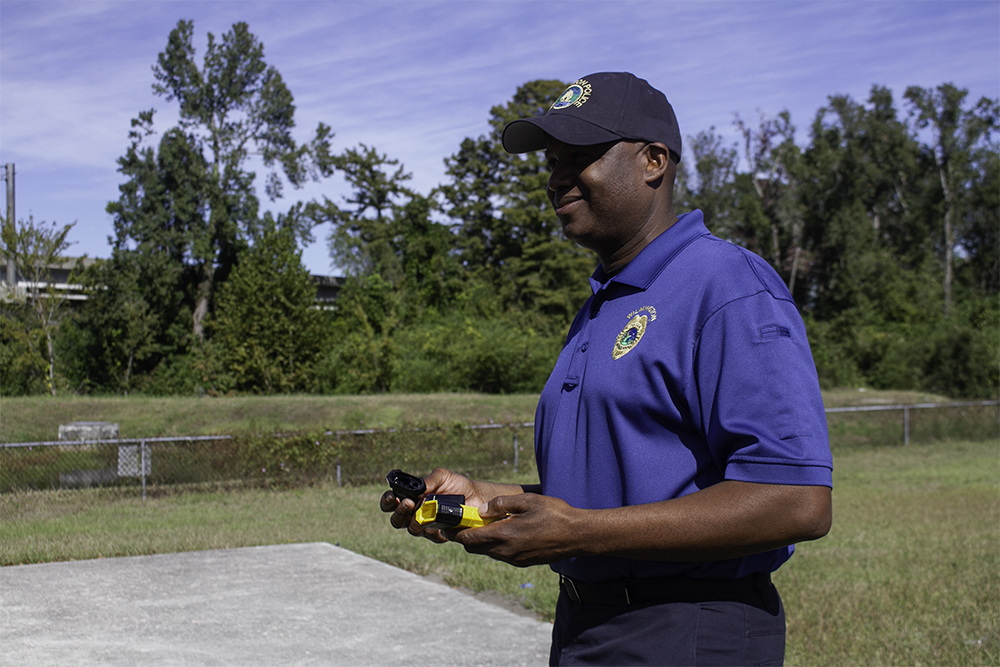 Assistant Chief Donnie Williams holds an empty BolaWrap. (Port City Daily photo/Johanna Ferebee)