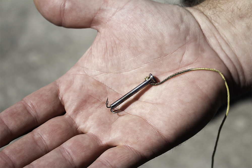 The BolaWrap features a pair of anchors, each equipped with four barbs which cling to clothing when deployed. (Port City Daily photo/Johanna Ferebee)