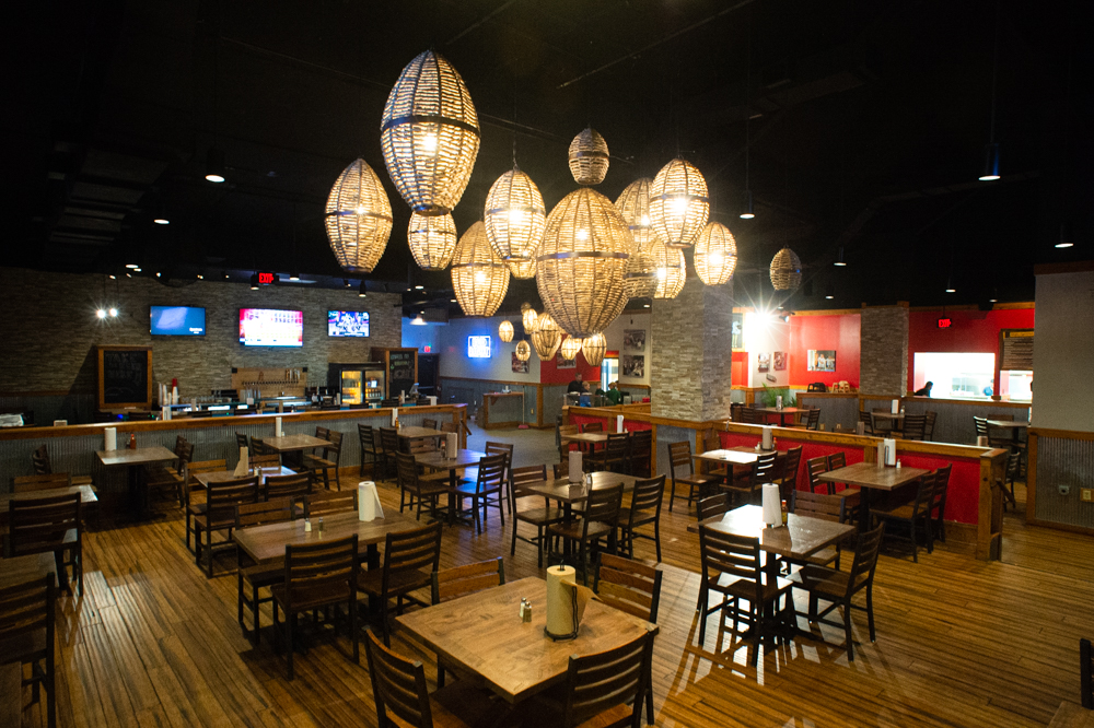 The new restaurant has higher ceilings, double the number of tables, and photography prints of Mexican street food along the walls. (Port City Daily photo/Mark Darrough)