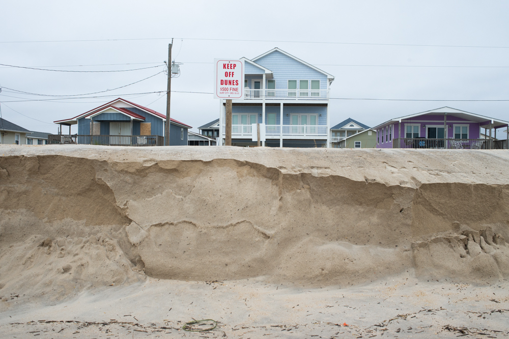 A four-to-five-foot escarpment on the 1300 block of North Shore Drive in Surf City on Monday afternoon. (Port City Daily photo/Mark Darrough)