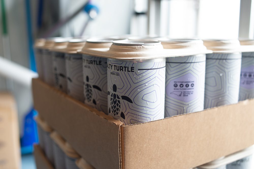 Salty Turtle is joining more than 50 other breweries across the world in using the E6PR biodegradable 4-pack and 6-pack holders to distribute its beer. (Port City Daily photo/Mark Darrough)