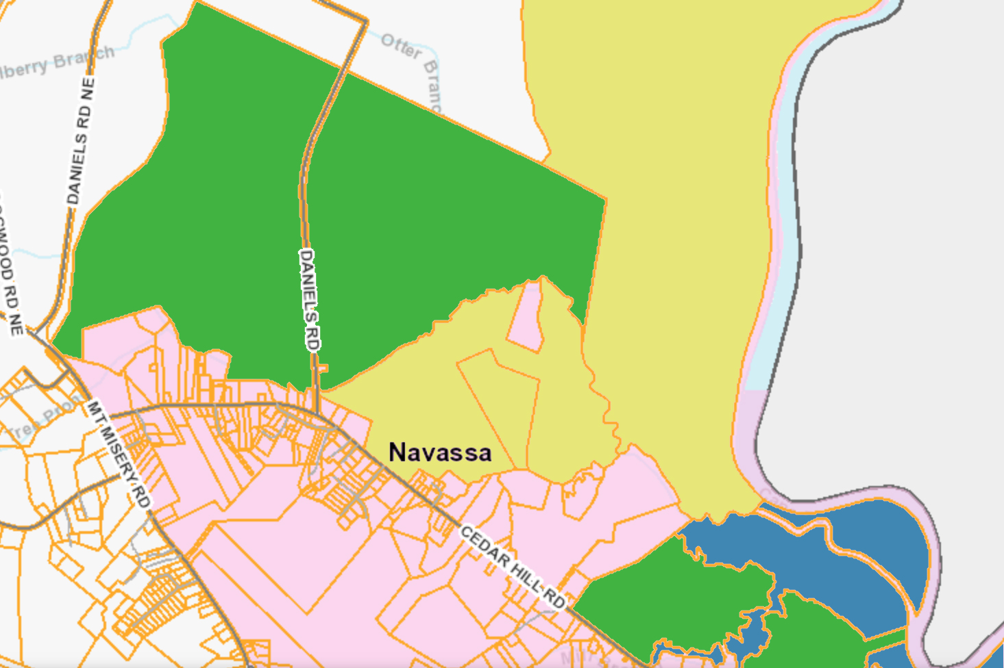 The Town of Navassa is looking to coordinate growth between two major Planned Unit Developments (PUD), shown in green. Indian Creek PUD straddles Daniels Road and RiverBend PUD is located off Cedar Hill Road. The Kerr-McGee Superfund site, in blue, is poised for redevelopment, according to an October 2019 EPA report. In yellow, two of NOAA's proposed restoration projects, including Indian Creek (center) and Lower Cape Fear Bottomlands Conservation (right). (Port City Daily photo/Courtesy Brunswick County GIS, edited by Port City Daily)