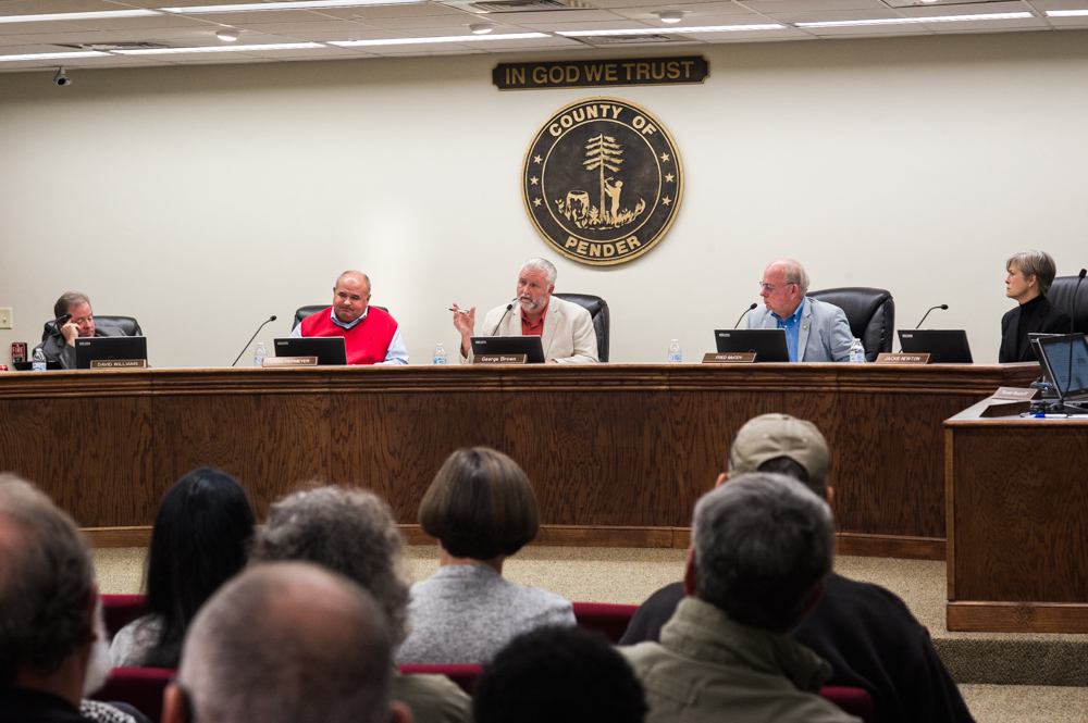 Pender County Chairman George Brown, center, during a meeting last spring. Brown and Fred McCoy, pictured to his left, were reelected to their positions as chairman and vice chairman of the board, respectively. (Port City Daily photo/Mark Darrough)