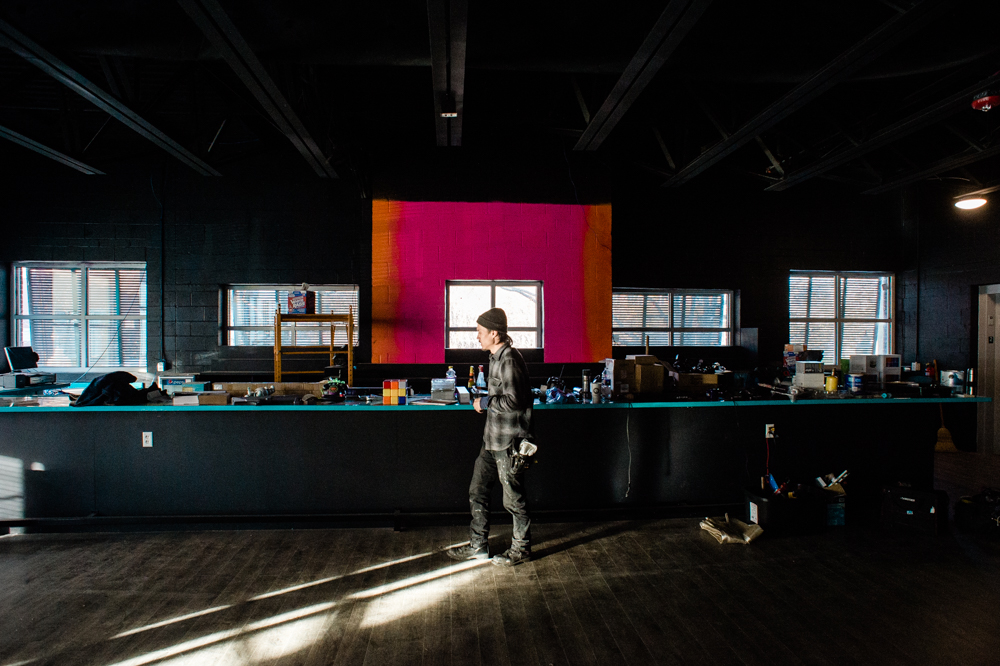 A worker in the future Coglin's Wilmington bar and club in downtown Wilmington. (Port City Daily photo/Mark Darrough)