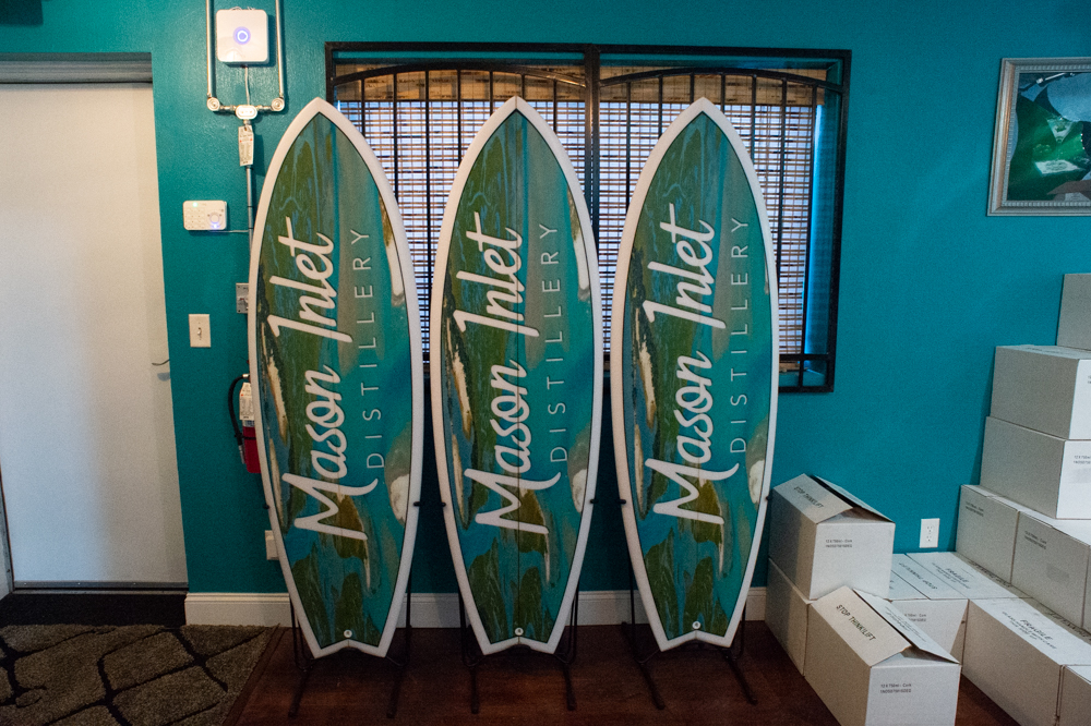 Tom Curran said he will send a locally made Savage Surfboard to advertise his brandy at three local ABC stores - one near the Wrightsville Beach Drawbridge, one on Eastwood Avenue, and one in Porters Neck. (Port City Daily photo/Mark Darrough)