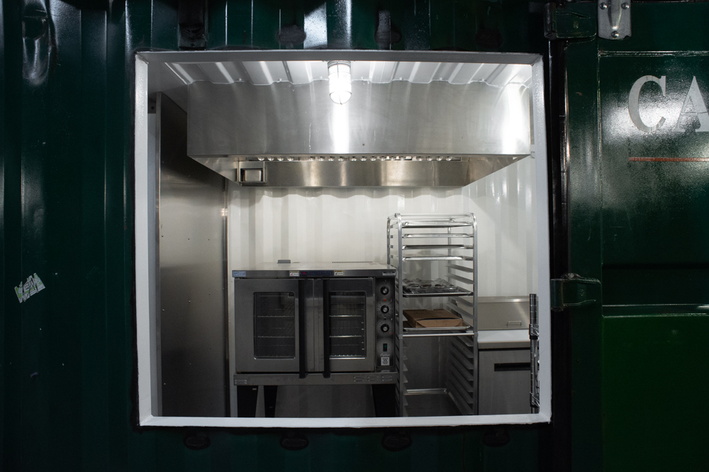 Bespoke's new bakery is built into a shipping container, designed as a "food truck without wheels," Bespoke owner Chris Batten said. (Port City Daily photo/Mark Darrough)