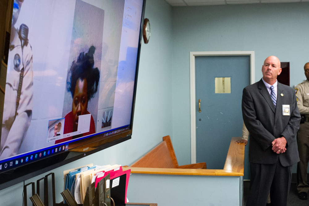 Sheriff Alan Cutler looks on as one of the murder suspects, Myasia Morange, 18, requests an in-person first appearance. (Port City Daily photo/Mark Darrough)