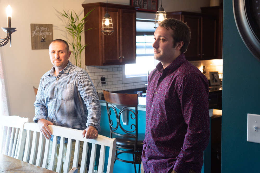 Timoth Kita, left, and his son Jordan Kita at their family home on Wednesday, where they denied any racist motivation on the night they showed up at the Shepard's residence. (Port City Daily photo/Mark Darrough)
