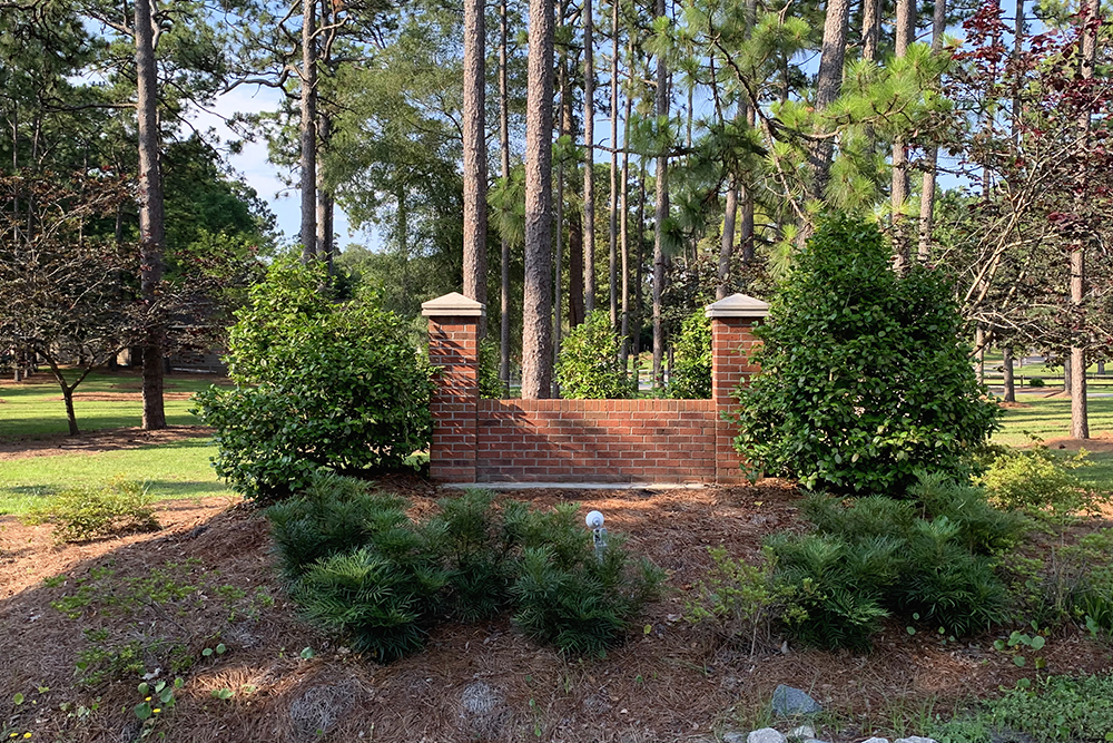 County employees removed signs for Hugh MacRae park and stored them in the park's maintenance yard over the weekend. (Port City Daily photo/Johanna F. Still)